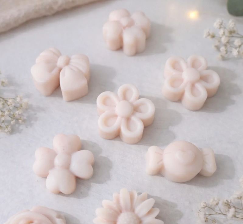Wax melts con forma de flor en tonos rosa